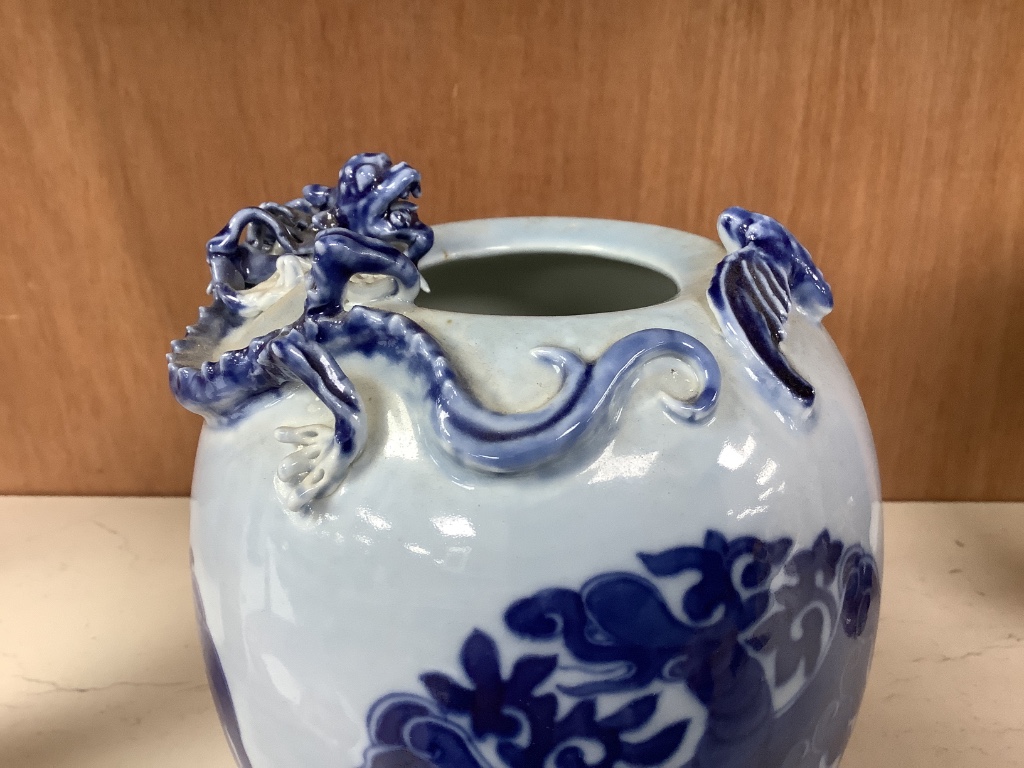 A Chinese blue ground blue and white dragon design vase, 17cm high